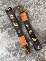 Load image into Gallery viewer, Haunted Portraits Wrist Lanyard
